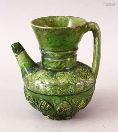 A GOOD ISLAMIC AUMAYAD GREEN GLAZED POTTERY EWER, 15.5cm high.