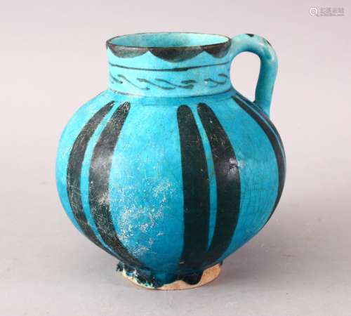 A GOOD EARLY ISLAMIC RAQA POTTERY EWER, with a blue glaze and decorated striping, 16cm.