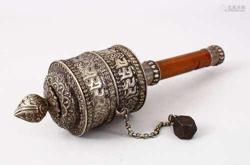 A FINE 19TH CENTURY TIBETAN SILVER PRAYER WHEEL & MANUSCRIPT, the wheel formed from white embossed