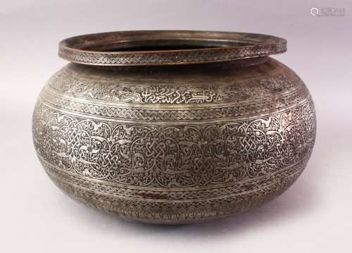 A LARGE ISLAMIC TINNED BRONZE SAFAVID CALLIGRAPHIC BOWL, the body with chased formal intertwined