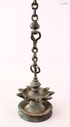 A 17TH / 18TH CENTURY INDIAN INSCRIBED BRONZE HANGING OIL LAMP, 14.5cm diameter.