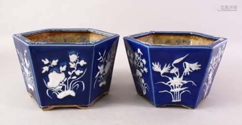 A GOOD PAIR OF 19TH CENTURY CHINESE POWDER BLUE AND CARVED PORCELAIN HEXAGONAL JARDINIERES, both