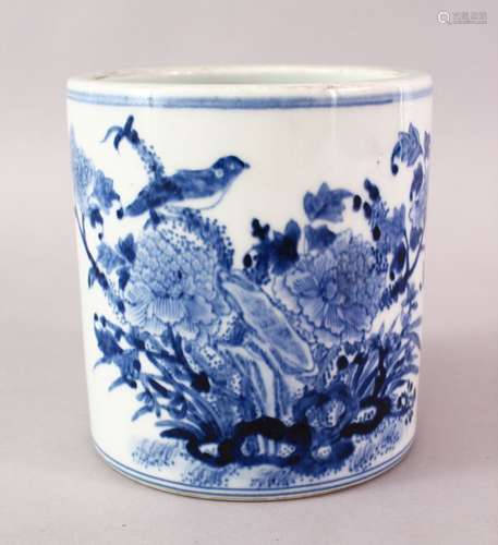 A LATE 19TH CENTURY CHINESE BLUE & WHITE PORCELAIN BRUSH POT, the body decorated with native