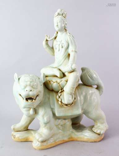 A GOOD LATE 19TH CELADON GLAZED FIGURE OF GUANYIN, the figure depicting guanyin elegantly seated