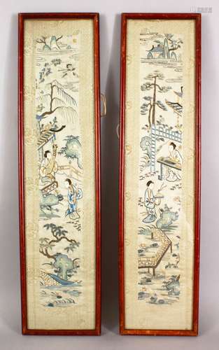 A PAIR OF 19TH CENTURY CHINESE FRAMED EMBROIDERED SILK PANELS, each depicting figures in garden