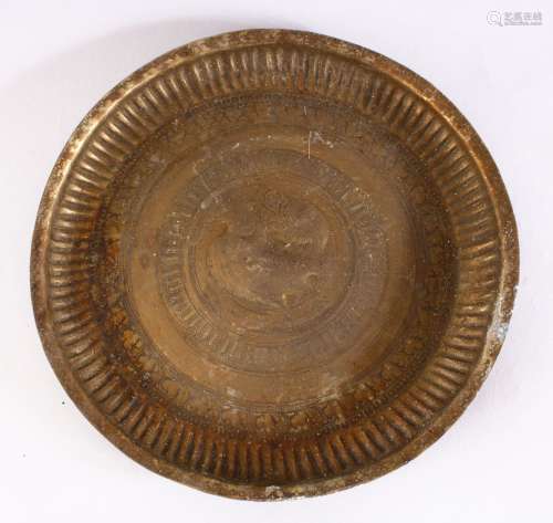 A 19TH CENTURY INDAIN BRASS CHARGER / DISH, with embossed decoration,