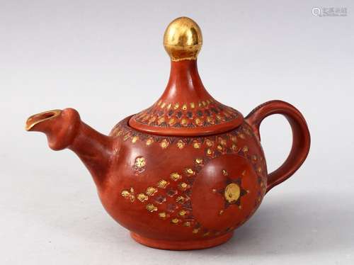 A GOOD TURKISH OTTOMAN CLAY & GILDED TOPHANE TEAPOT & COVER, the body incised and gilded depicting