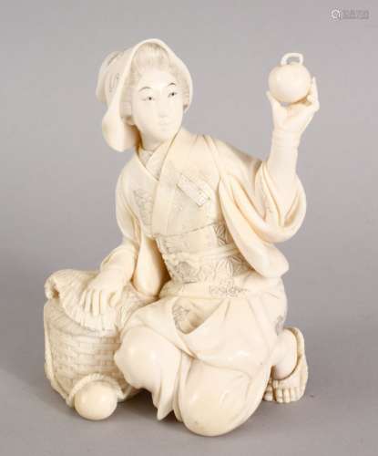 A GOOD JAPANESE MEIJI PERIOD CARVED IVORY OKIMONO OF A LADY HOLDING A PEACH, the lady in a seated