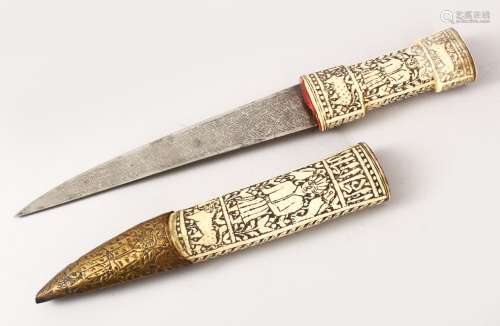 AN EARLY PERSIAN QAJAR HAND CARVED BONE / IVORY DAGGER, with carved decoration of figures and