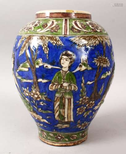 AN EARLY QAJAR POTTERY JAR, decorated with figures upon a blue ground within landscapes, 30cm high x