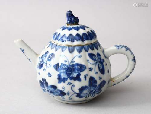 A 19TH CENTURY CHINESE BLUE* WHITE PORCELAIN MOULDED TEA POT & COVER, in the form of a fruit, The