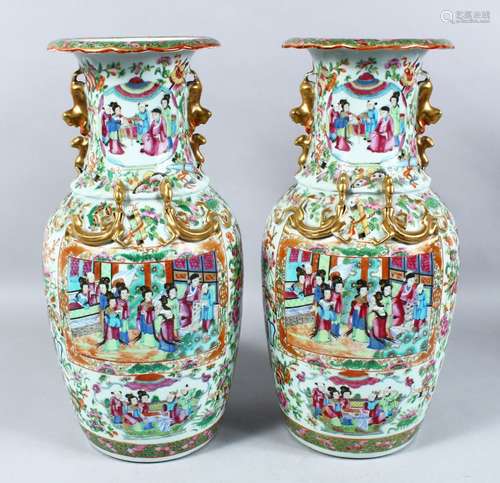 A GOOD PAIR OF 19TH CENTURY CHINESE CANTON FAMILLE ROSE PORCELAIN VASES, the body of the vases