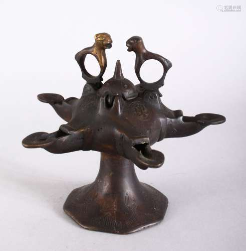 A GOOD POSSIBLY 13TH CENTURY ISLAMIC PERSIAN BRONZE CALLIGRAPHIC OIL LAMP, with five spouts and