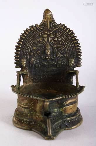 A GOOD 16TH / 17TH CENTURY INDIAN BRONZE JAIN SHRINE, 14cm high x 9cm wide.