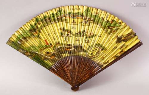 A CHINESE 20TH CENTURY WOODEN AND PAINTED CALLIGRAPHIC FAN, One side with a native view of china,