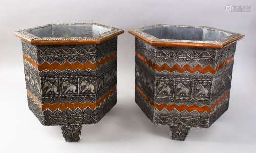 A PAIR OF EARLY 20TH CENTURY INDIAN WHITE METAL AND COPPER HEXAGONAL JARDINERES, decorated with