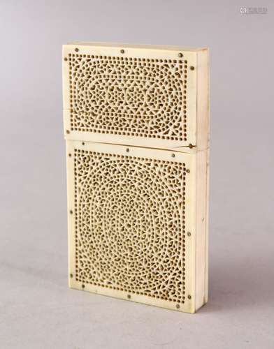 A 19TH CENTURY INDIAN PIERCED IVORY CARD CASE, 10cm x 5.5cm