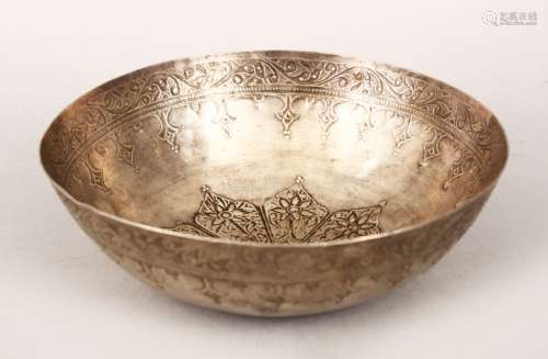 AN 19TH CENTURY ISLAMIC MALAYSIAN SILVER BOWL, the exterior engraved with scrolling foliate