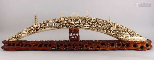 A VERY LARGE AND FINE 19TH CENTURY CHINESE CARVED IVORY BRIDGE GROUP, the bridge group carved to