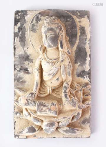 A GOOD CHINESE 19TH CENTURY CARVED POTTERY WALL BRICK, depicting a seated goddess, 25cm x 15cm.