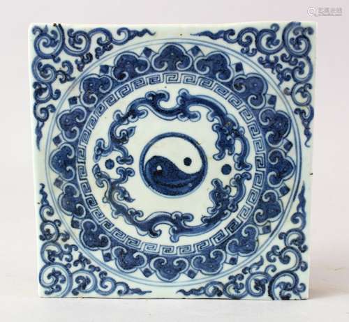 A CHINESE MING STYLE BLUE & WHITE PORCELAIN TILE, decorated with bagua and ruyi, 19.5 cm square,