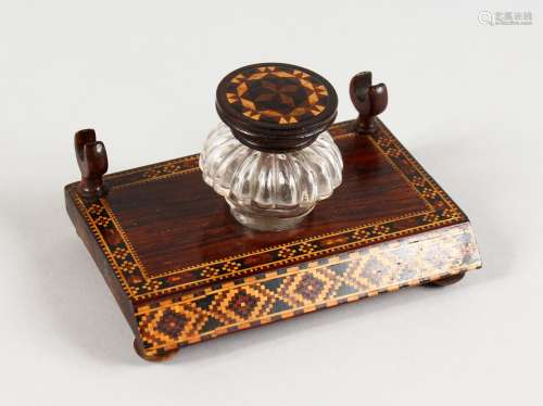 A TUNBRIDGE WARE INKSTAND, with glass bottles. 4.75ins long.