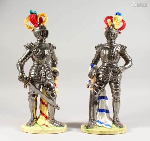 A LARGE PAIR OF ITALIAN PORCELAIN FIGURES OF MEN IN SUITS OF ARMOUR, with coloured plumes,