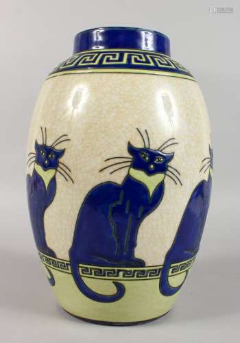 AN ART DECO DESIGN VASE, decorated with blue cats. 12ins high.