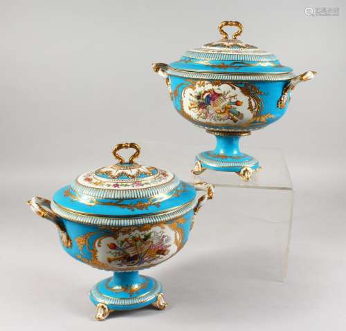 A PAIR OF SEVRES STYLE PORCELAIN TWIN-HANDLED PEDESTAL TUREENS AND COVERS, pale blue ground