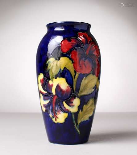 A MOORCROFT POTTERY VASE, blue ground, 