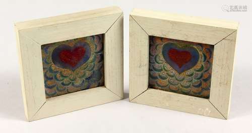 A PAIR OF SMALL LUSTRE DECORATED FRAMED TILES. 4.25ins wide.