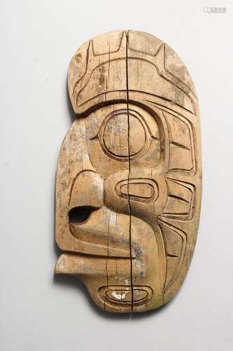 A CARVED WOOD NATIVE AMERICAN MASK, signed Larry Joseph, Golamish(?) B.C. 7.5ins high.