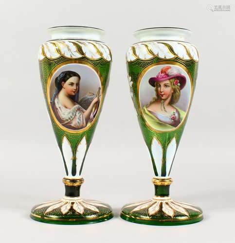 A PAIR OF 19TH CENTURY BOHEMIAN GREEN GLASS VASES, each with an oval panel painted with a portrait