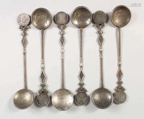 SIX CHINESE WHITE METAL COIN SPOONS. 6.5ins long.