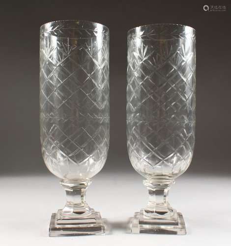 A PAIR OF CUT GLASS STORM LANTERNS. 13ins high.