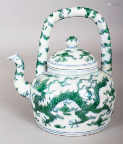 A CHINESE MING STYLE DOUCAI PORCELAIN DRAGON EWER & COVER, with overhead handle, the base with a