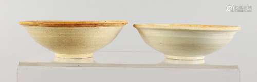 TWO EARLY CHINESE EARTHENWARE BOWLS.