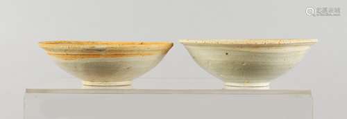 TWO EARLY CHINESE EARTHENWARE BOWLS.