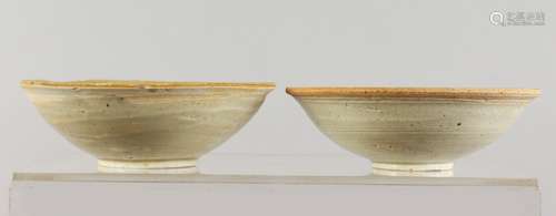 TWO EARLY CHINESE EARTHENWARE BOWLS.