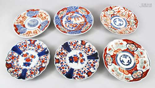 SIX JAPANESE IMARI PORCELAIN PLATES, various designs in typical imari taste, 22cm down to 20.5cm.