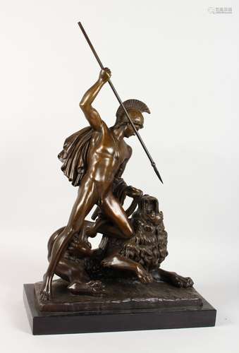 A GOOD CAST BRONZE GROUP, a gladiator impaling a snarling male lion, on a marble base. 25ins high.