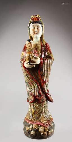 A LARGE PORCELAIN FIGURE OF GUANYIN.