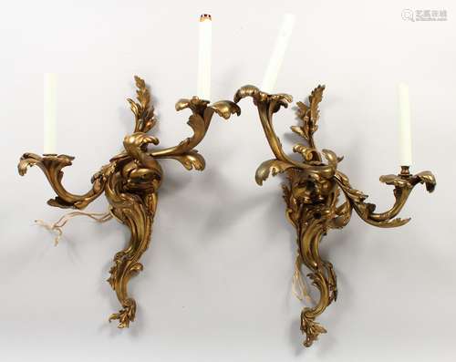 A PAIR OF BRONZE ROCOCO STYLE TWIN-BRANCH WALL APPLIQUES.