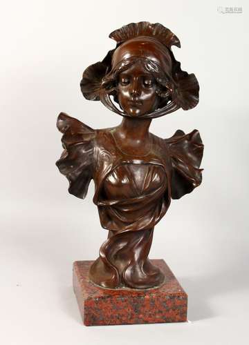 H. JACOBS AN ART NOUVEAU BRONZE BUST OF A YOUNG LADY, on a square granite base. 20ins high including