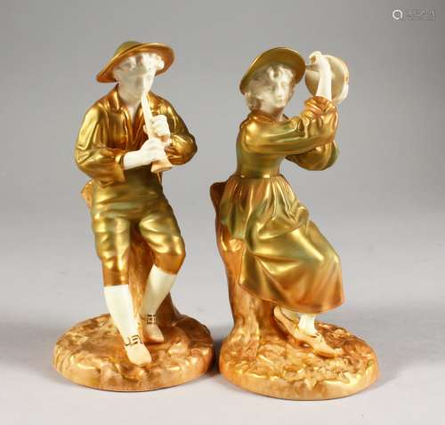 A PAIR OF ROYAL WORCESTER PORCELAIN FIGURES, modelled as the boy piper Stephon and companion