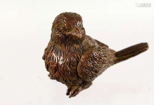 A JAPANESE BRONZE MODEL OF A BIRD. 2ins long.