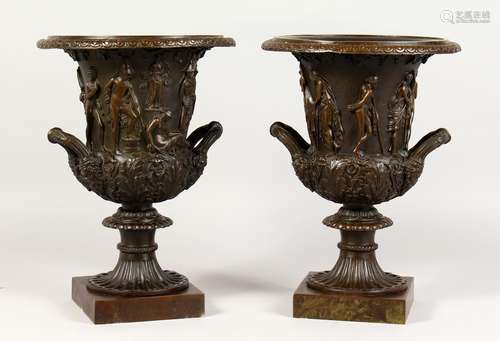 A GOOD PAIR OF CLASSICAL STYLE CAMPAGNE SHAPED URNS, relief moulded with classical figures, on