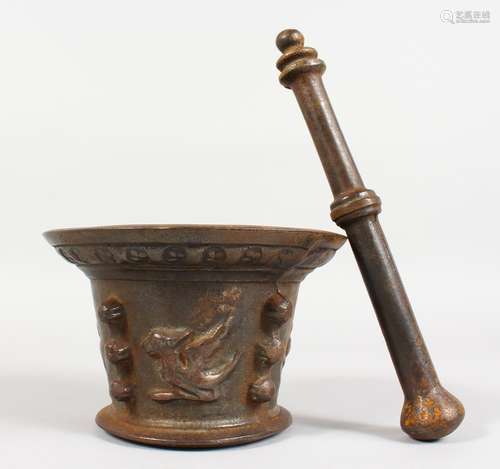 A DECORATIVE CAST IRON PESTLE AND MORTAR. 4.5ins high.