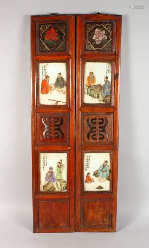 A PAIR OF CHINESE NARROW WOODEN PANELS, each mounted with a pair of porcelain panels. 36.5ins x 7.