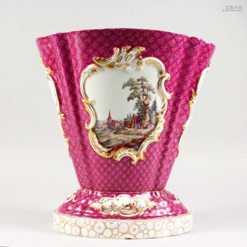 AN AUGUSTUS REX PORCELAIN VASE AND STAND, in the Meissen style, pink scale ground, the vase and